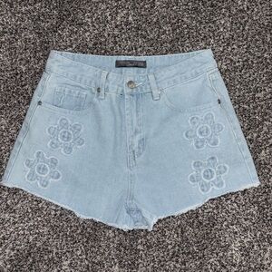 Cali 1850 light wash jeans with flowers on each side never worn size 5